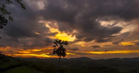 Sunset mountain range beautiful landscape mist, dusk golden time dramatic sky. B Stock Footage 155084617