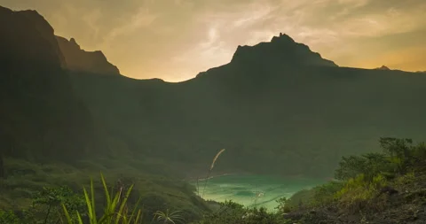 Sunset mountain range beautiful landscape mist foggy sunrise beam Stock Footage 312714136