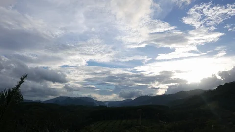 Sunset mountain range in rainforest with mist, fog and clouds Stock Footage 93109017