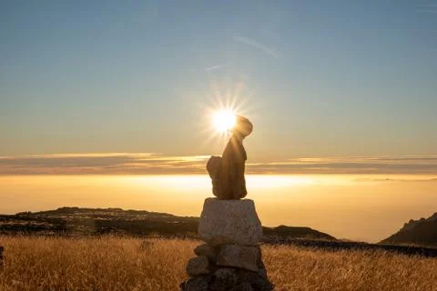 Sunset on the mountain with a ray of sun Stock Photos