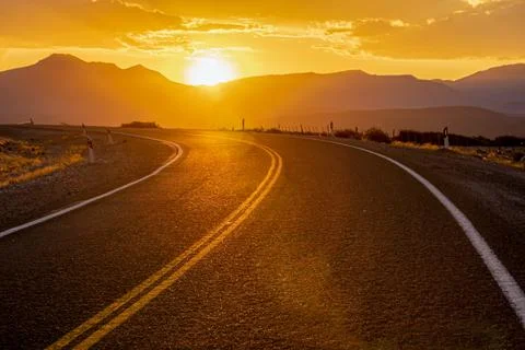 Sunset on the mountain route Stock Photos