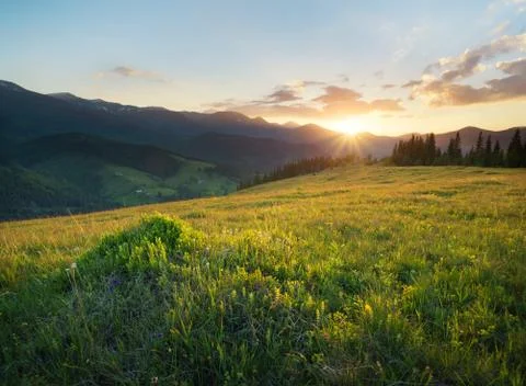 Sunset in the mountain valley. Beautiful natural landscape in the summer time Foto stock