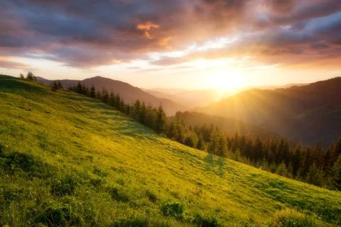 Sunset in the mountain valley Stock Photos