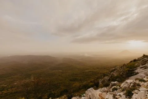 Sunset in a mountain valley Stock Photos