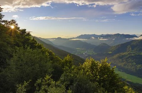 Sunset in the mountain valley. 스톡 사진