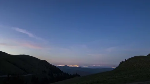 Sunset mountain view city panorama lights Stock Footage 76583817