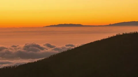 Sunset at the mountains above the clouds, Tenerife Stock Footage 57640177