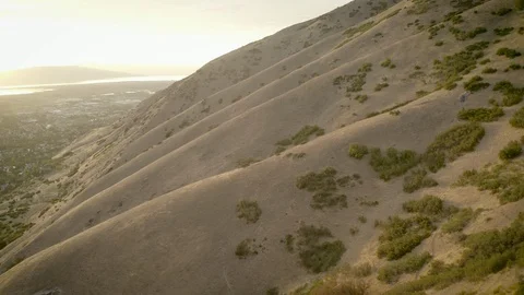 Sunset mountains and city Stock Footage 102533575