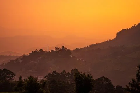 Sunset in the mountains and greenery at Munnar Kerala Stock Photos