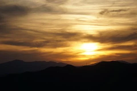 Sunset with mountains in the background in Malaga Stock Photos