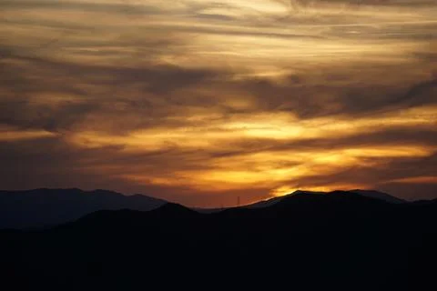 Sunset with mountains in the background in Malaga Stock Photos