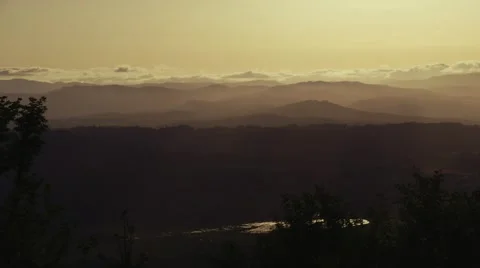 Sunset mountains with clouds and rays Stock Footage 44494583