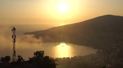 Sunset in the mountains, the clouds go fast, on a background of mountains Stock Footage 67421751