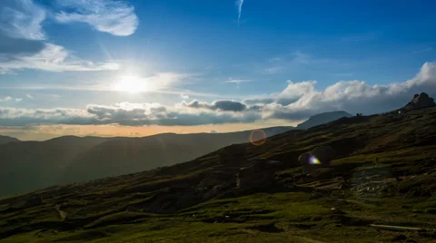 Sunset in the mountains with cloudy sky Stock Footage 39604416