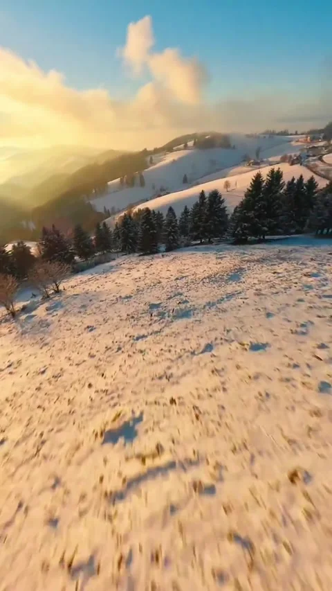 Sunset in the mountains covered with snow Stock Footage 273075933
