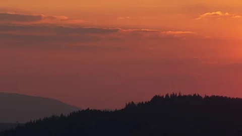 Sunset in the mountains. Horizontal panning. Stock Footage 75750230