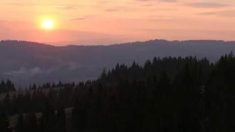 Sunset in the mountains. Horizontal panning. Stock Footage 75750385