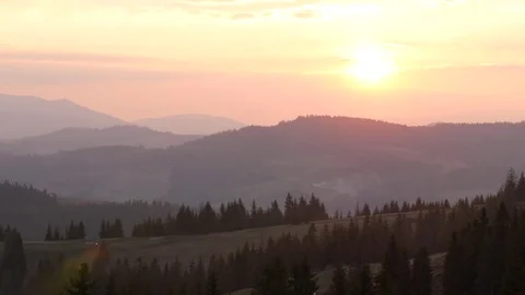 Sunset in the mountains. Horizontal panning. Stock Footage 75750544