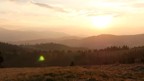 Sunset in the mountains. Horizontal panning. Stock Footage 75750632