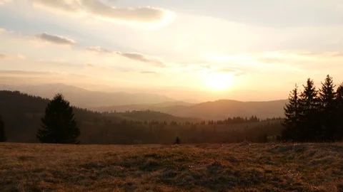 Sunset in the mountains. Horizontal panning. Stock Footage 75750642