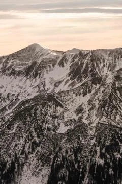 Sunset in the mountains, orange sunset, clouds, sky and mountains Stock Photos