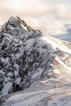 Sunset in the mountains, orange sunset, clouds, sky and mountains Stock Photos