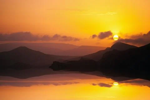 Sunset in mountains Фото