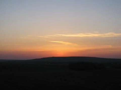 Sunset at mountains Stock Photos