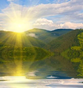 Sunset in mountains Stock Photos