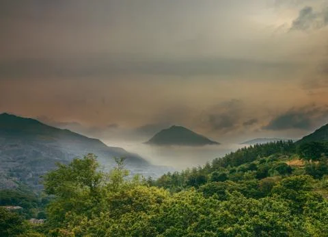 Sunset in mountains Stock Photos