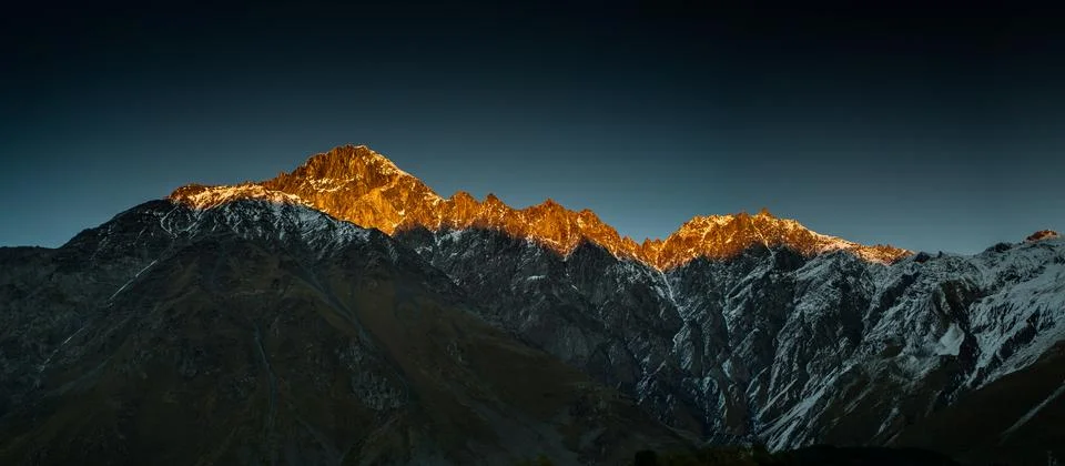 Sunset in the mountains Stock Photos