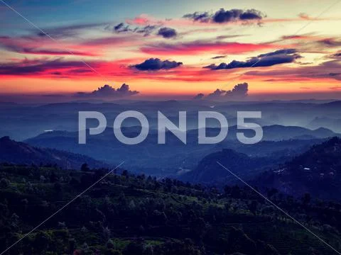 Sunset in mountains Stock Photos