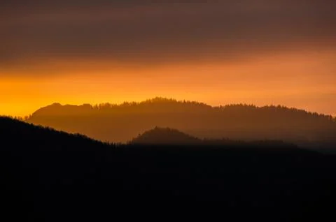 Sunset in the mountains Stock Photos