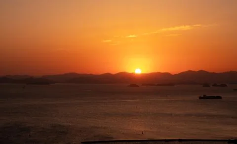 Sunset to the mountains Stock Photos