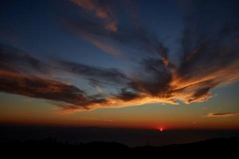 Sunset in the mountains Stock Photos