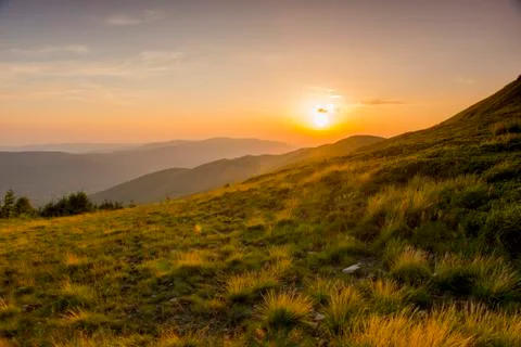 Sunset in the mountains Stock Photos