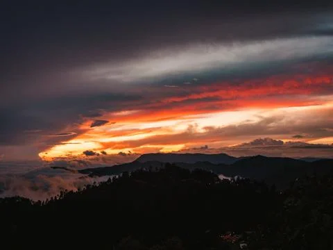 Sunset in the mountains Stock Photos