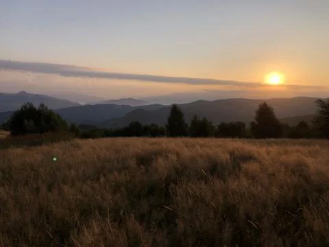 Sunset in the mountains Stock Photos