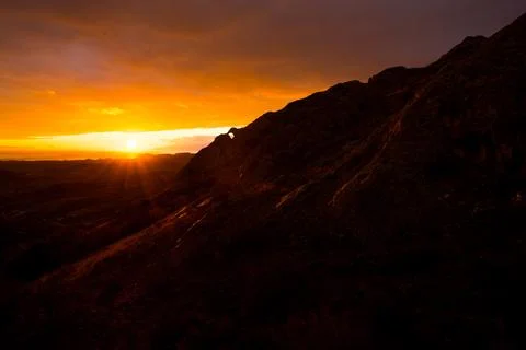 Sunset in the mountains Stock Photos