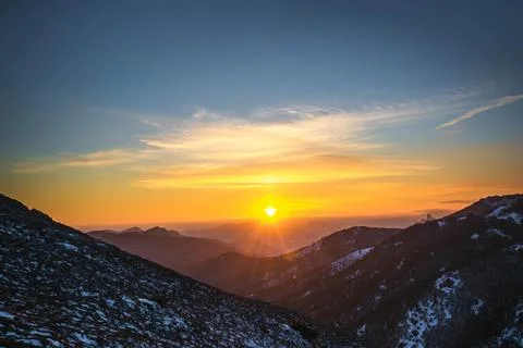 Sunset in the mountains Stock Photos