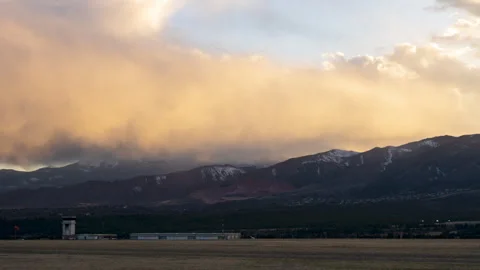 Sunset in the Mountains with Rain Falling Stock Footage 278282748