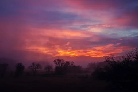 Sunset in the mountains - red sky Stock Photos