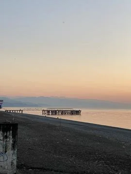 Sunset mountains sea Stock Photos