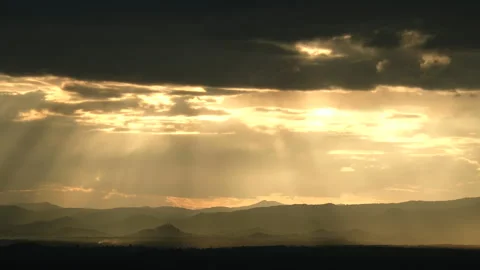 Sunset in the mountains with sun rays and clouds Stock Footage 277863374