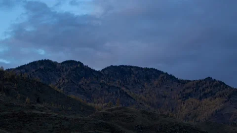 Sunset in the mountains. Sunset in the mountains, sky color changes from blue to Stock Footage 199486350