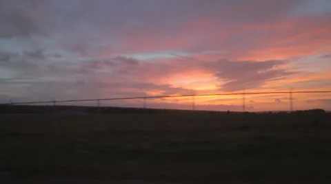 Sunset from moving vehicle Stock Footage 29654801