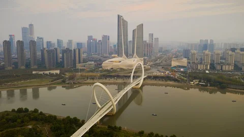 Sunset nanjing modern riverside complex eye bridge aerial timelapse 4k china Vídeo Stock 124680037