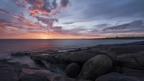Sunset near Alnes lighthouse Stock Footage 87807693