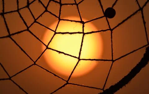 Sunset with net of dreamcatcher Stock Photos