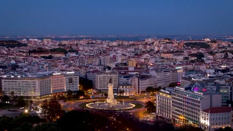 Sunset to night time lapse view of the skyline of Lisbon city Stock Footage 231885736
